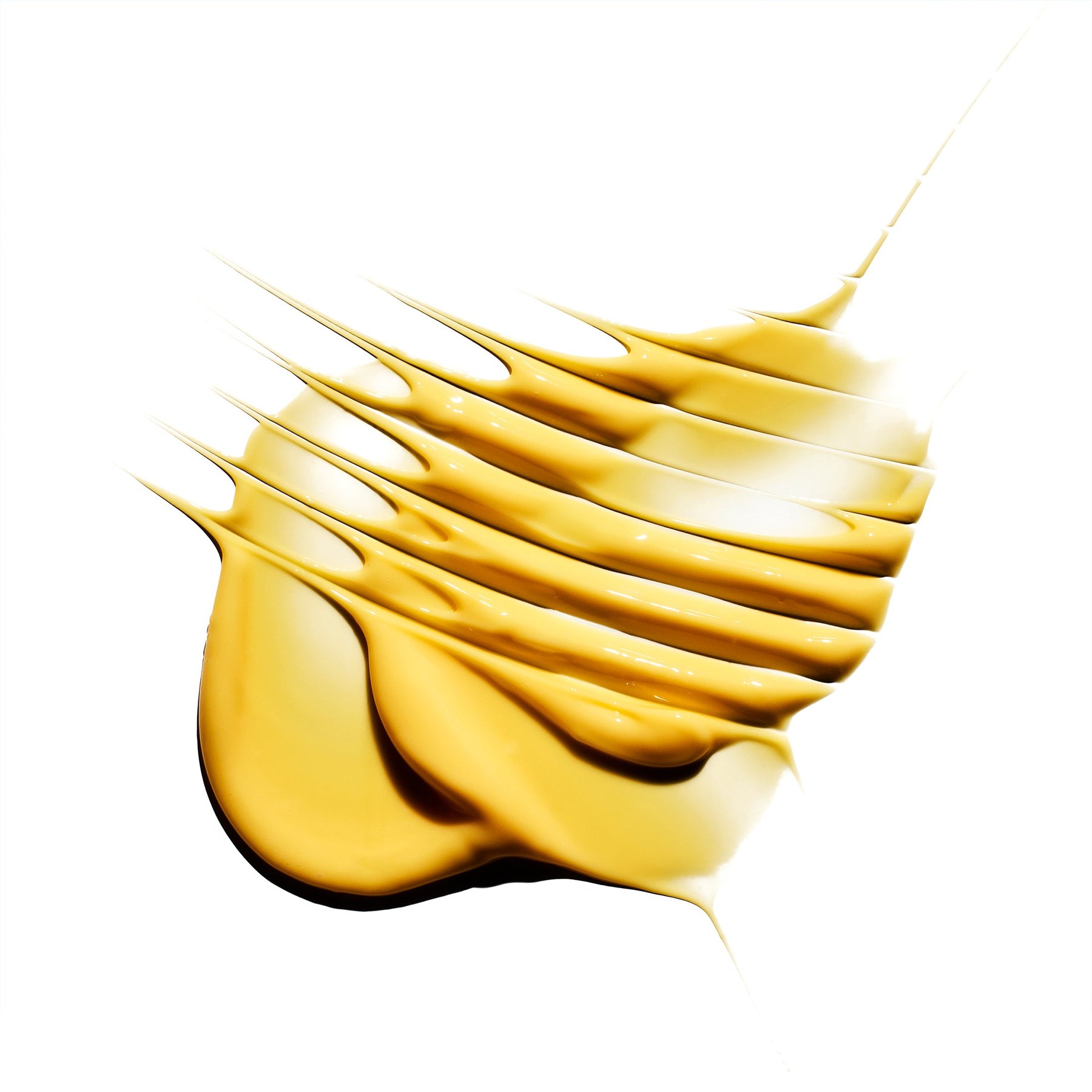 Lipid Gold spread in a swatch, tinted pale yellow by sea buckthorn seed and fruit oils.